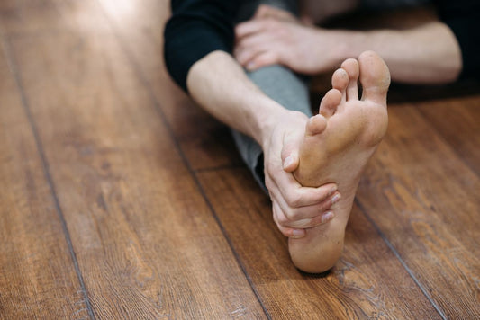 Foot stretching exercise for arch pain relief