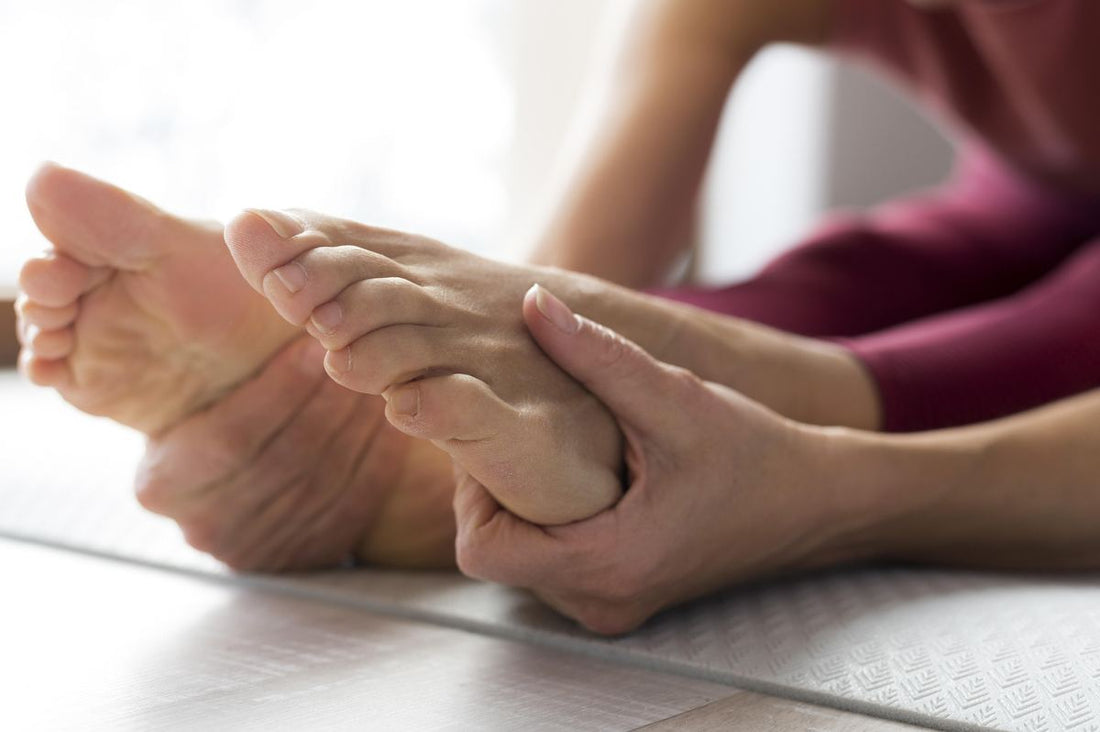 Close-up of foot experiencing nerve pain and tingling sensations