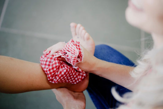 Ice pack applied to an injured foot during recovery from a plantar fascia tear